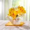 Blumenarrangement Gießkanne mit Narzissen Eldo